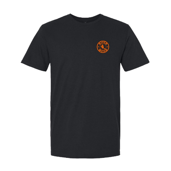 Black t‑shirt with a small orange circular Ditch Witch logo printed on the left chest.