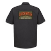 Black work shirt with a large rectangular “Ditch Witch Since 1949 – Built Like You” graphic printed on the back.
