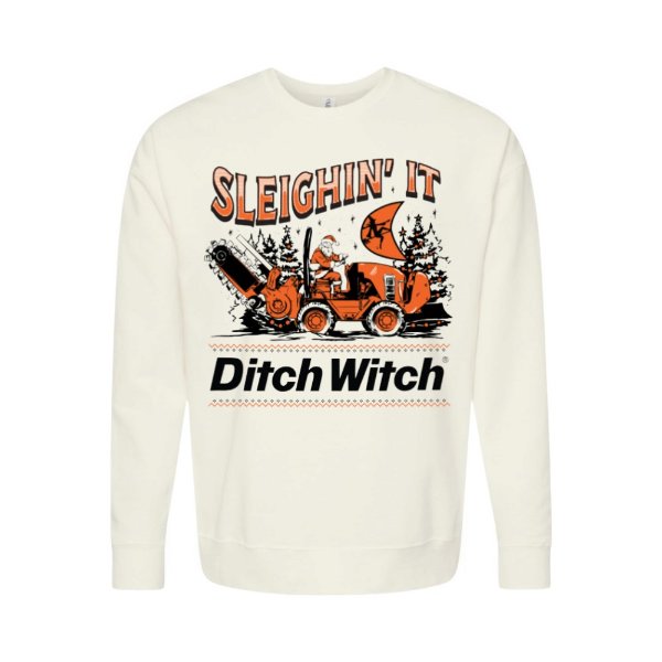Off-white Ditch Witch 2026 Holiday Sweater featuring a “Sleighin’ It” graphic with Santa operating Ditch Witch equipment, evergreen trees, snowflakes, and bold Ditch Witch branding.